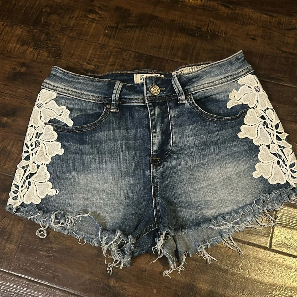 Jean shorts with Lace Floral Detail. Jean Shorts & Jeans $12 or 2x$20 - Picture 1 of 3
